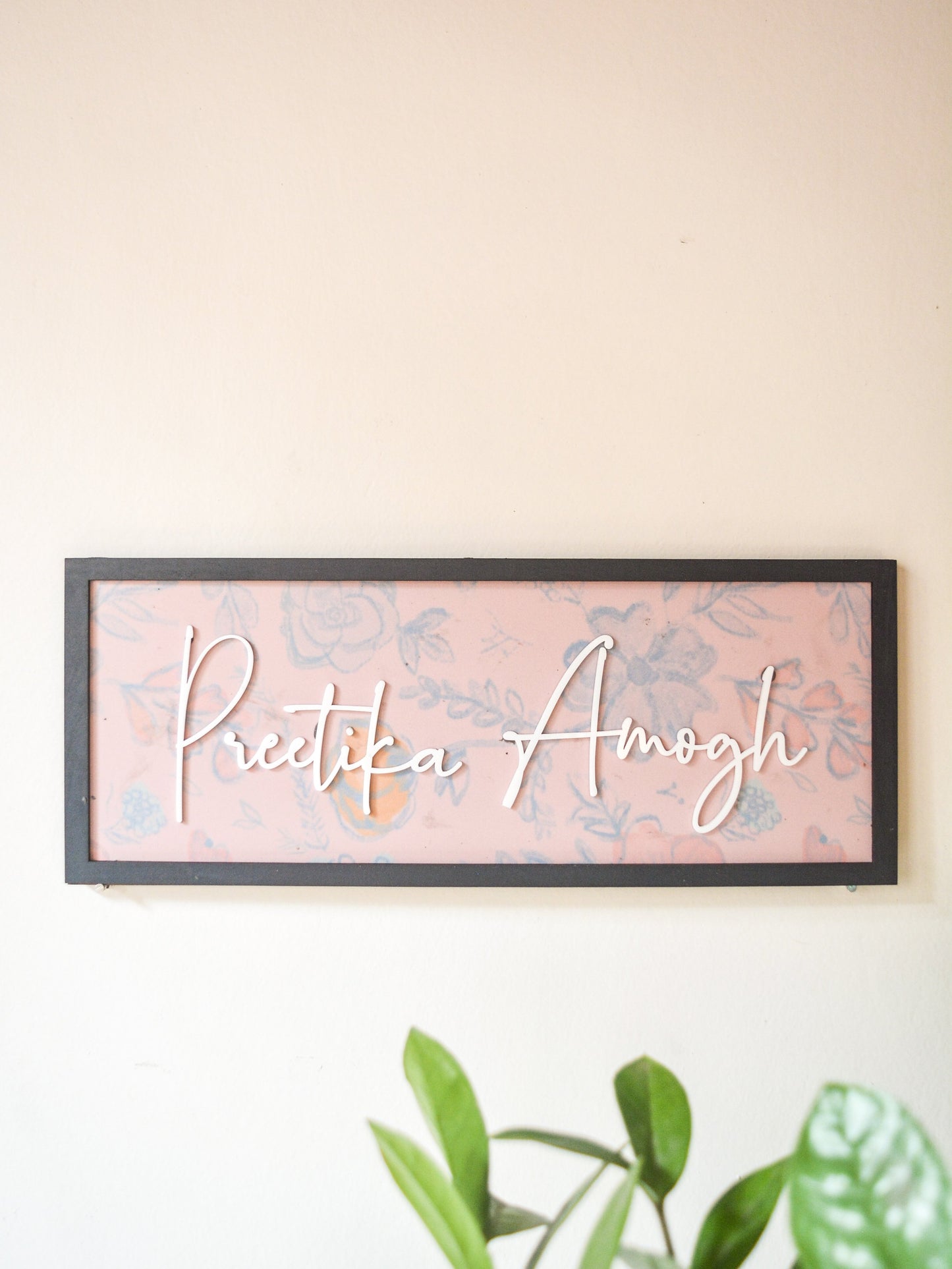 framed couple pink nameplate